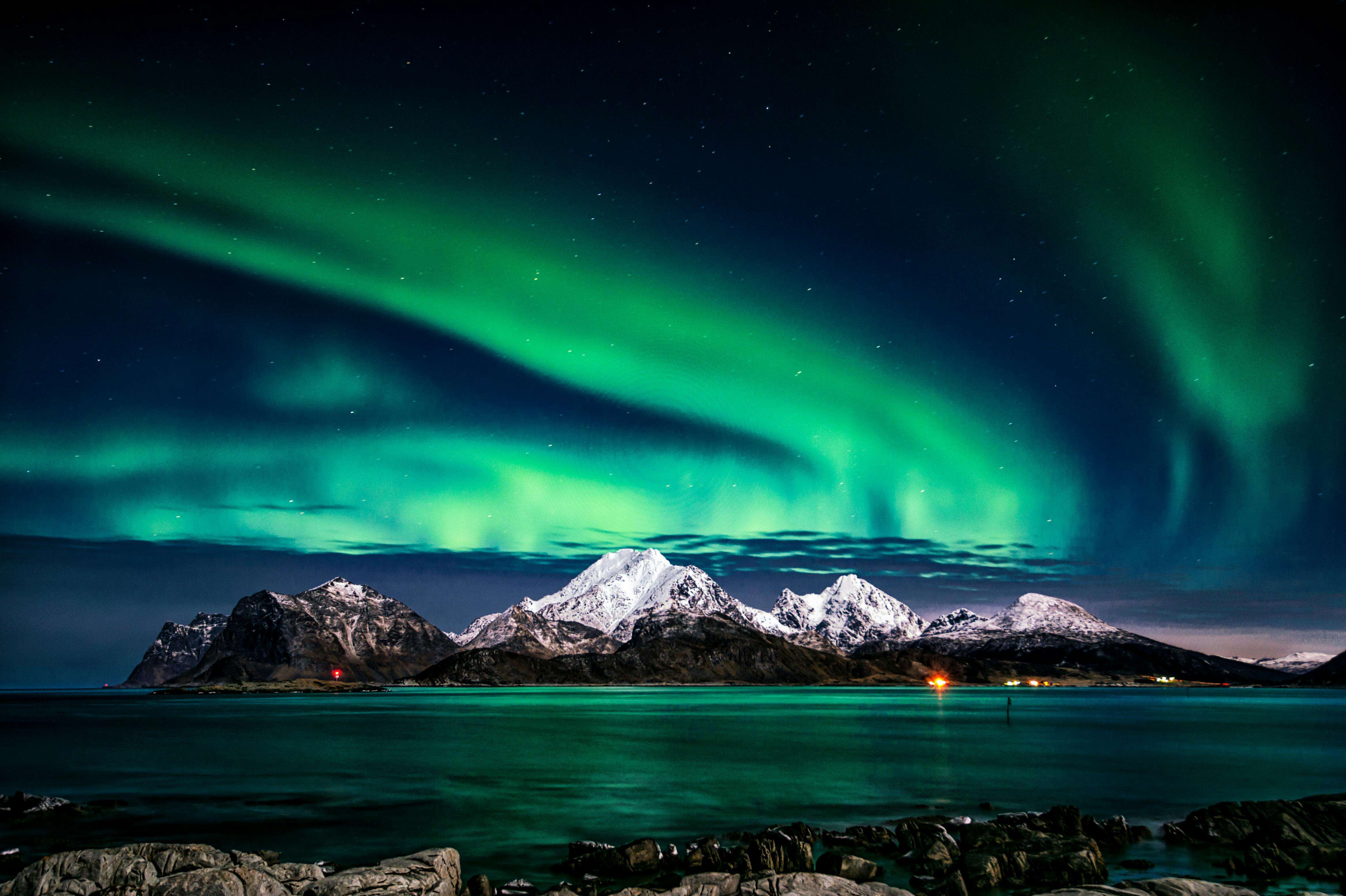 Aurora borealis northern lights over mountains